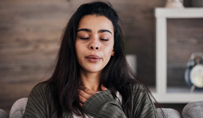 Woman having respiratory issues