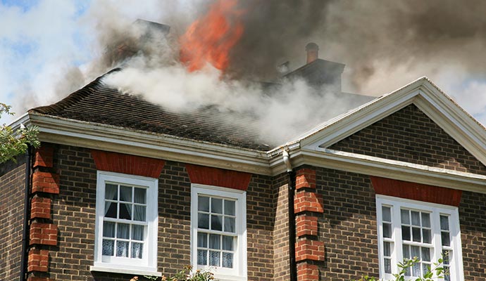 Fire burning a house