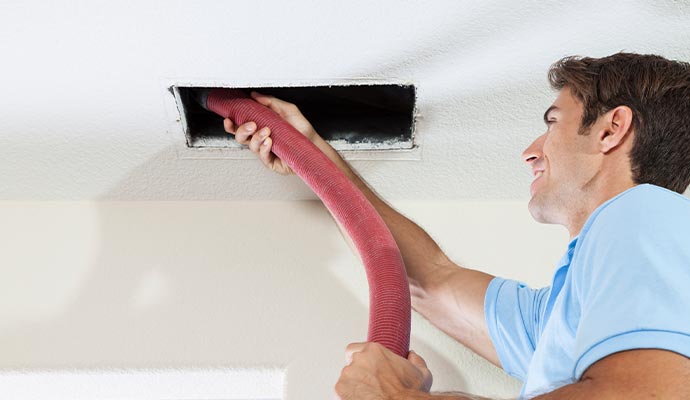 Professional duct cleaning with equipment