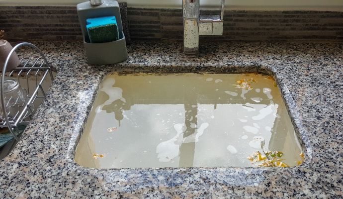 overflowing kitchen sink